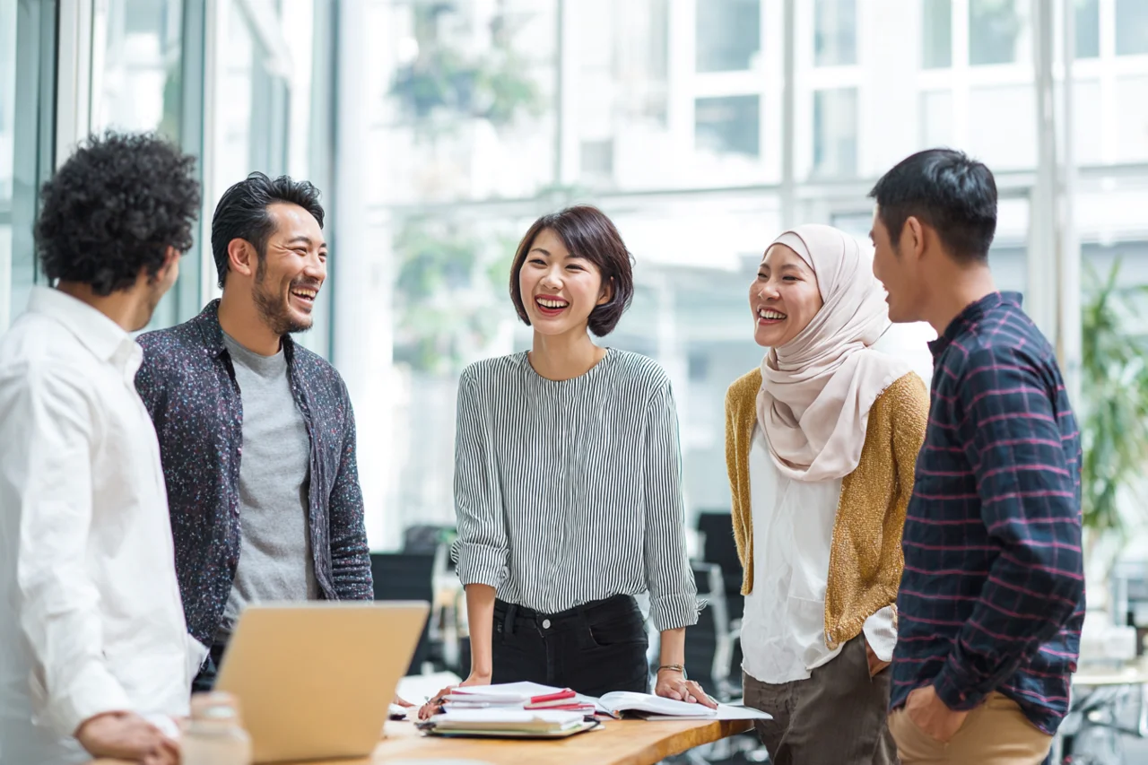 Illustrative business team reviewing a shared workspace